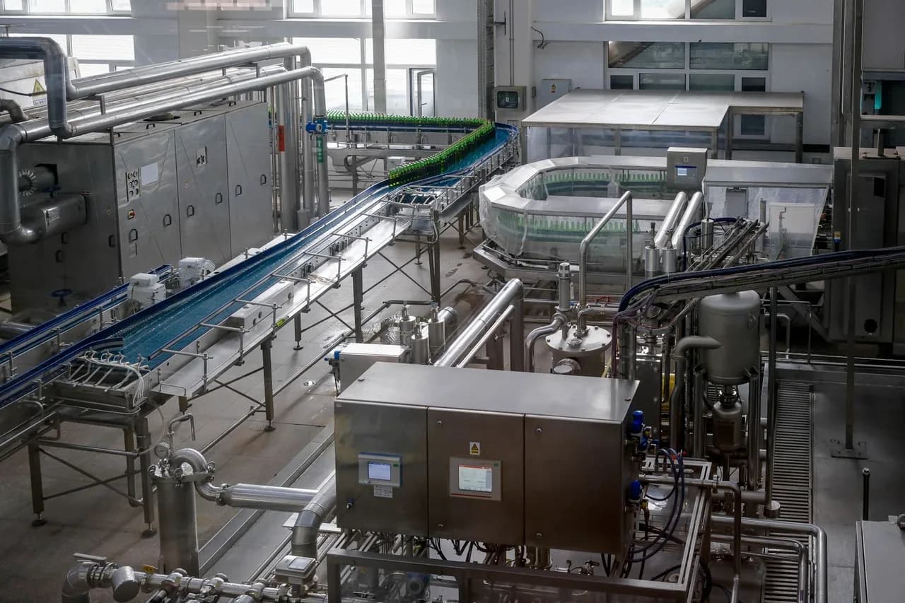 Bright automated bottling line in a modern factory