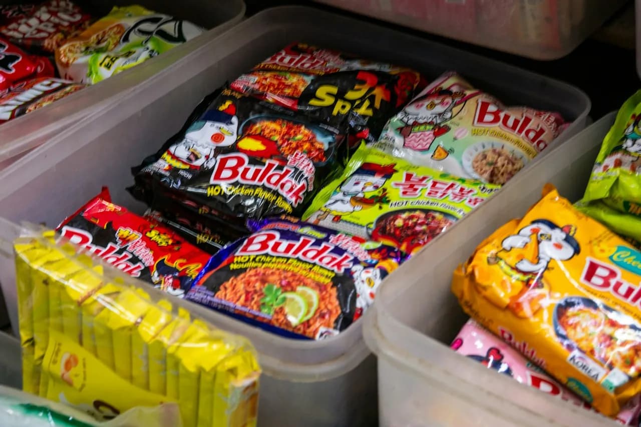 Buldak spicy chicken ramen packets in a market display